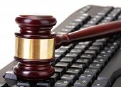 picture of keyboard  - wooden gavel on keyboard isolated on white - JPG 