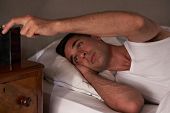 stock photo of thirties  - Man unable to sleep - JPG 
