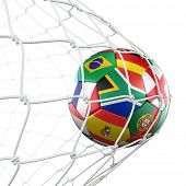 stock photo of france  - 3d rendering of a soccer ball in a net with flags of the participating countries in world cup 2010 - JPG 
