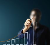 pic of hand  - Male hand drawing a chart isolated on white background - JPG 