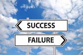 stock photo of outcome  - Success or failure sign in front of cloudy blue sky - JPG 