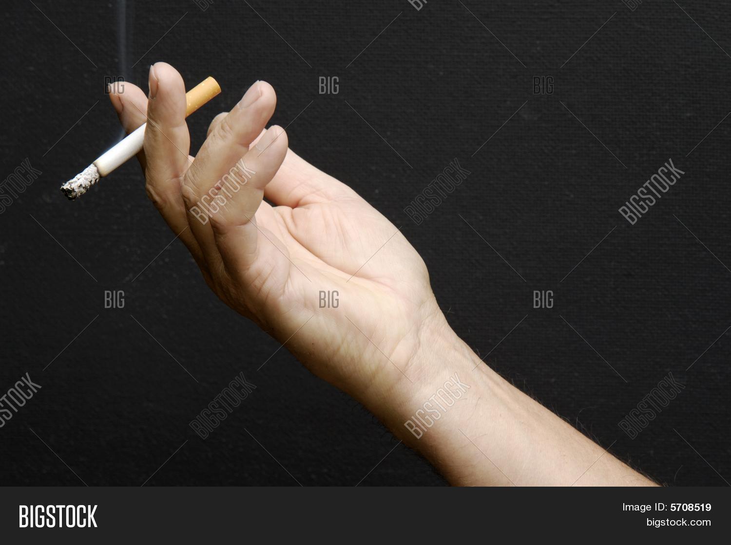 Male Hand Holding Smoking Cigarette Image & Photo Bigstock