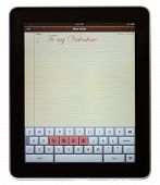 stock photo of spell  - LOVE spelled out on keypad of pad computer with space for message - JPG 