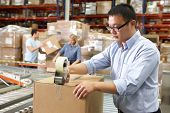 picture of order  - Workers In Distribution Warehouse - JPG 