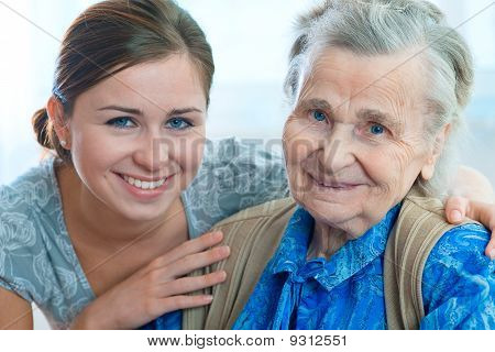 Picture or Photo of Senior woman with her doctor or caregiver
