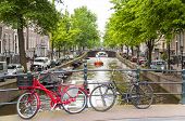 picture of bridge  - Detail of bicycles locked on top of bridge in Amsterdam - JPG 