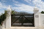 stock photo of gate  - Beautiful gate securing privacy in a Portuguese town - JPG 