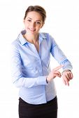 pic of watch  - young businesswoman checks time on her wrist watch - JPG 