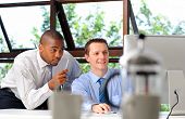 image of businessmen  - African businessman mentors his white associate on how to deal with customers effectively - JPG 