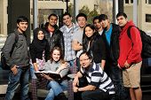 picture of group  - Diverse Group of Students in College Campus with buildings on the background - JPG 