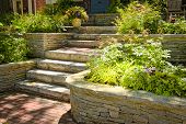 stock photo of nature  - Natural stone landscaping in home garden with stairs - JPG 