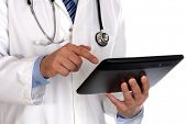 foto of technology  - Doctor using a digital tablet on white background - JPG 