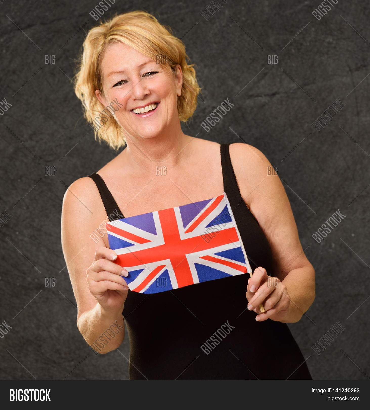 Happy Mature Woman Holding British Flag On Wall Stock Photo & Stock Images | Bigstock