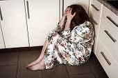 picture of pressure  - Adult woman crying sitting on the floor - JPG 