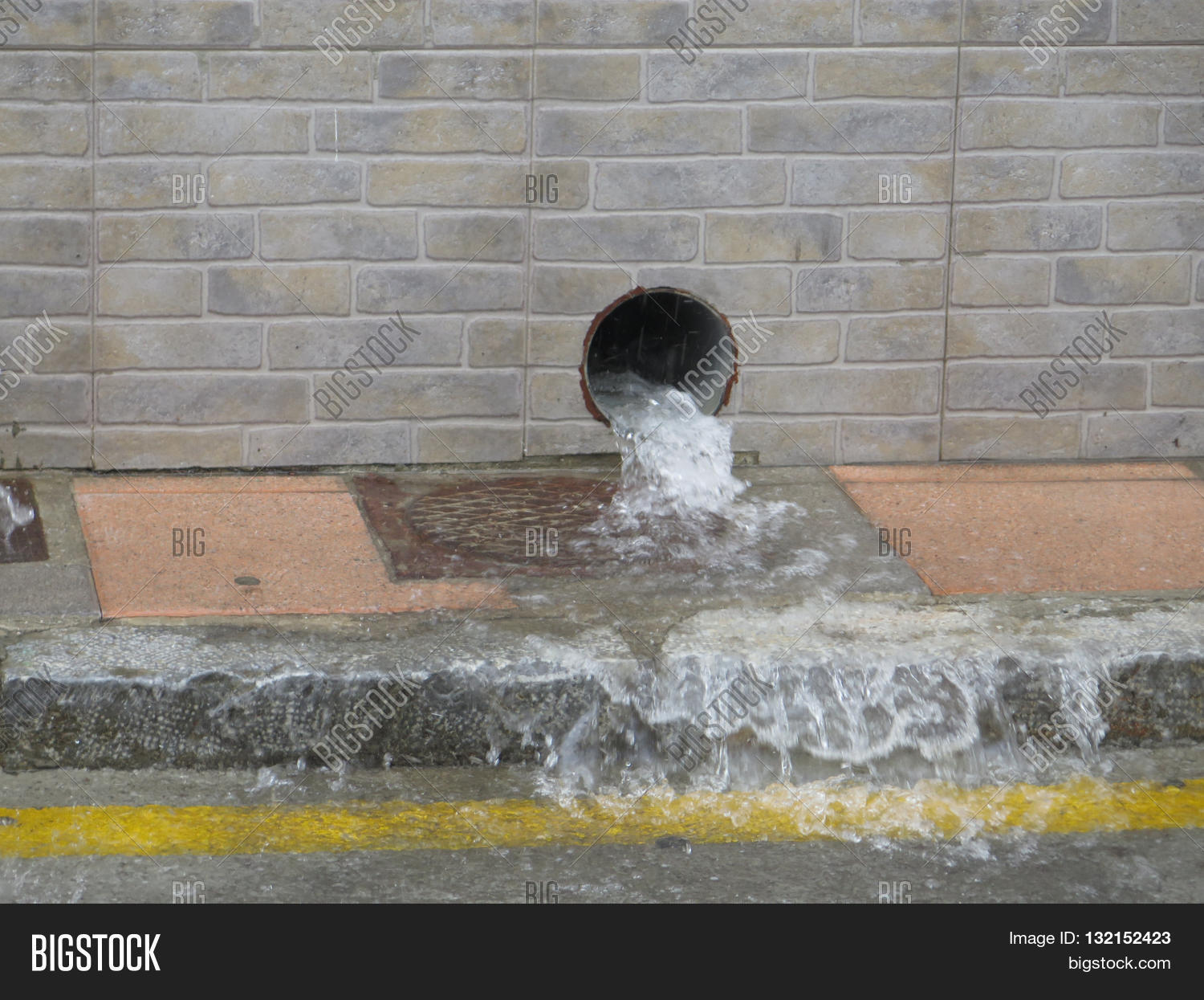 Water Gushing Out Rainwater Drain Image & Photo Bigstock