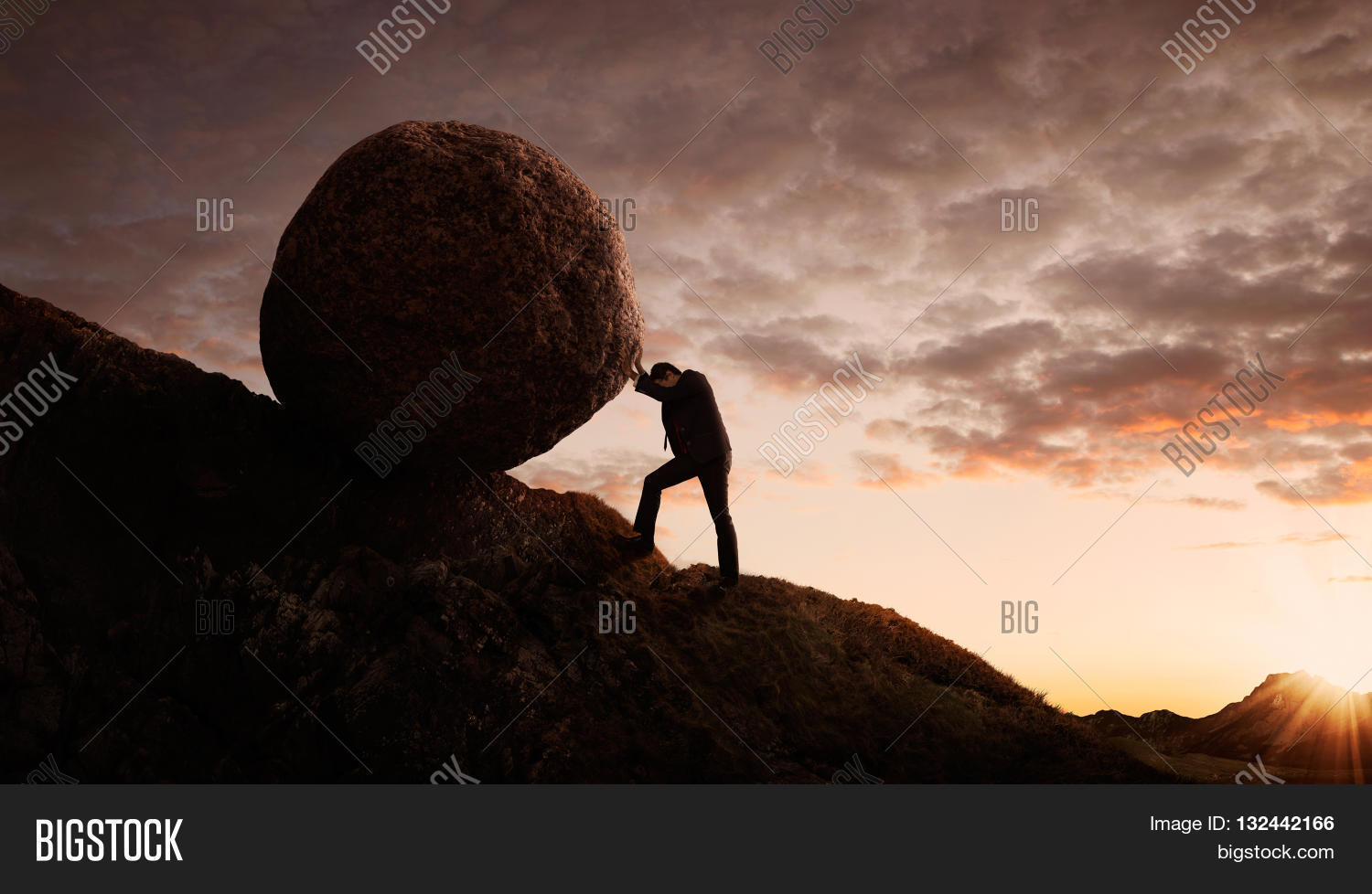 Business concept Young businessman pushing large stone uphill with copy