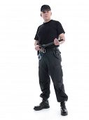 foto of security  - Security man wearing black uniform holding police club in both hands standing confidently - JPG 