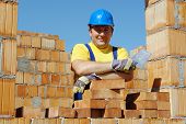 foto of construction worker  - Construction worker wearing yellow t - JPG 