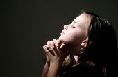 foto of religion  - An image of a young girl praying - JPG 