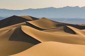 foto of valley  - Sand dunes over sunrise sky in Death Valley California - JPG 
