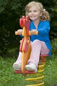 picture of teeter  - Playing on a teeter totter - JPG 