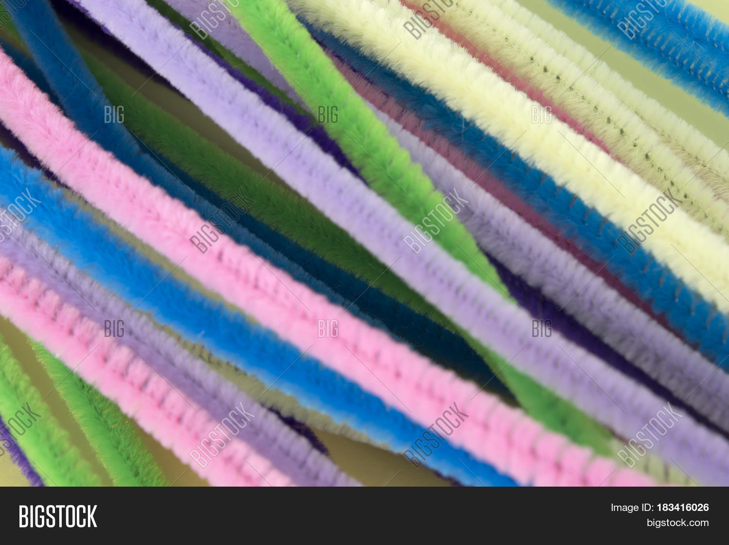 This is a photograph of Pastel colored pipe cleaners Stock Photo