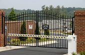 foto of security  - Security Gate at the Entrance of a New Gated Community - JPG 