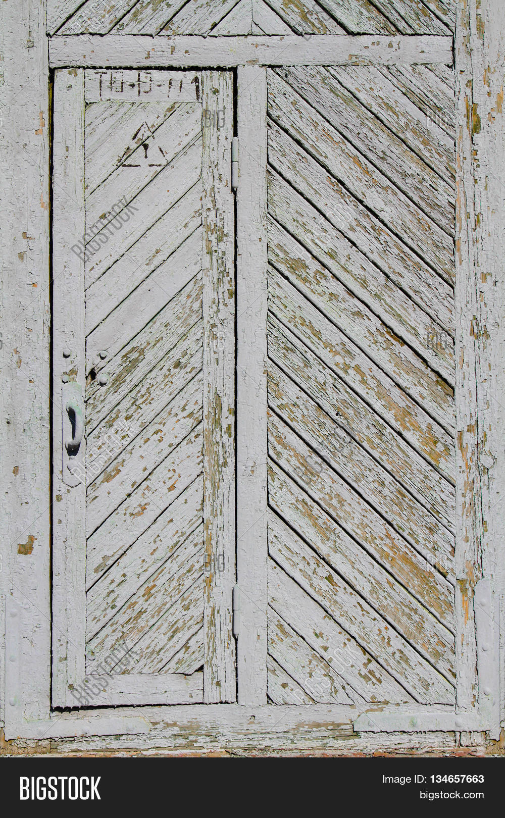 Old grey wood door in a herringbone pattern Stock Photo & Stock Images