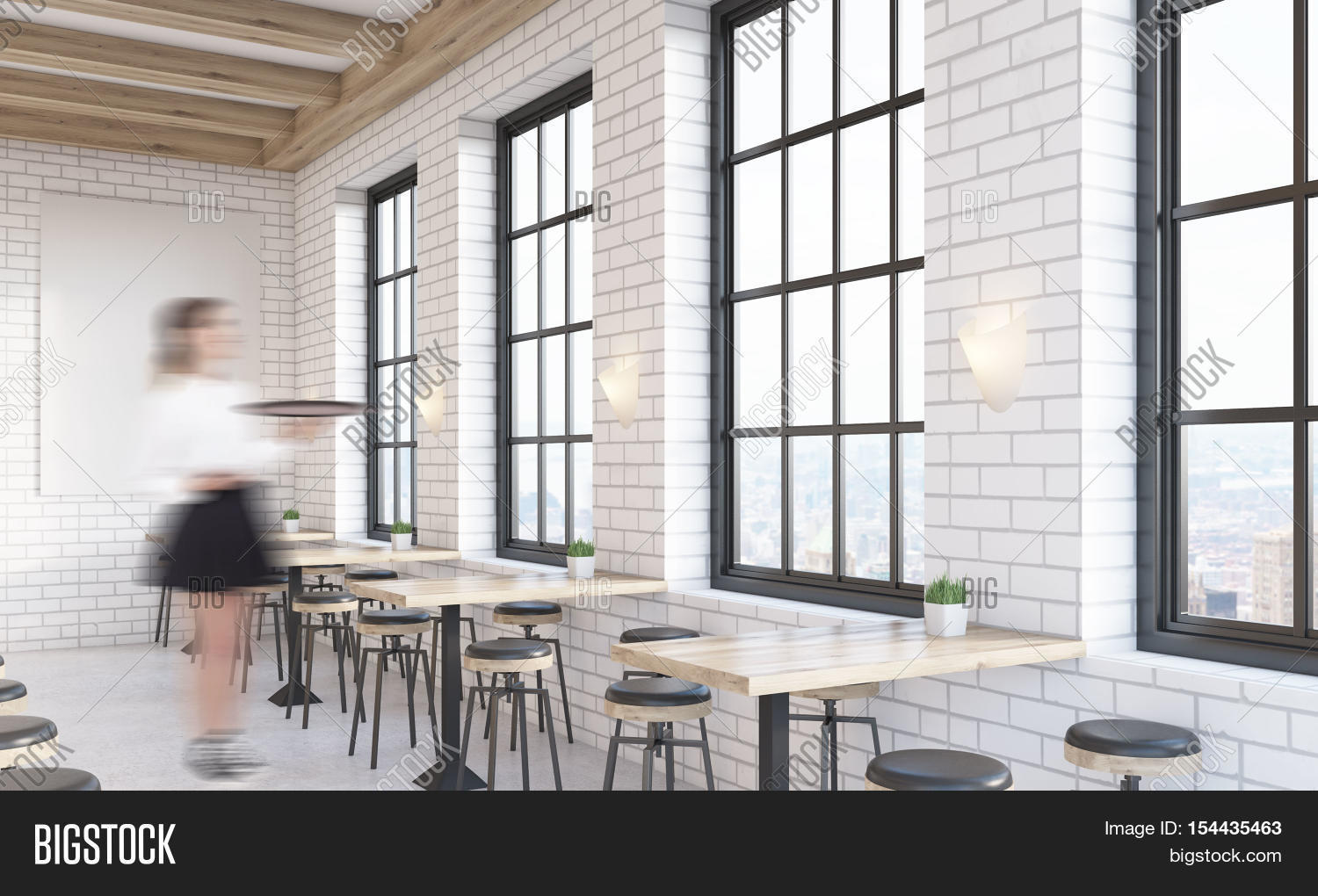 cafe interior with large vertical poster on white brick wall cafe interior with large vertical poster on white brick wall