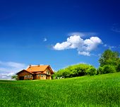 stock photo of investment  - New house on blue sky - JPG 