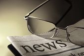 foto of newspaper  - newspaper and eyeglasses - JPG 
