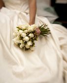 foto of tilting  - bride holding white rose bouquet shot with tilt - JPG 