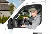 picture of transportation  - Smiling truck driver in the car - JPG 