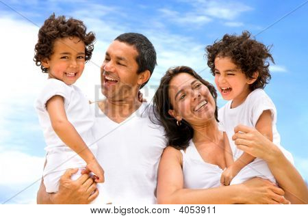 Picture or Photo of Happy family smiling outdoors while on vacation