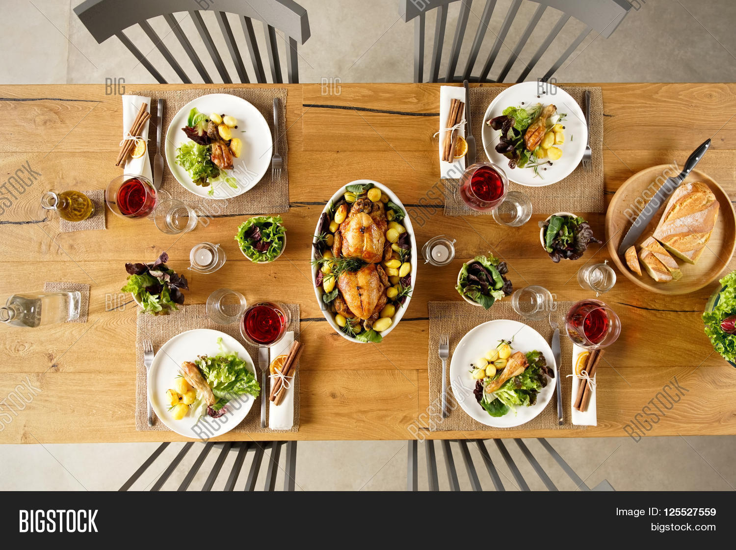 Dining Table Top View top view of two roasted chicken in a bowl on lunch table. high Dining Table Top View top view of two roasted chicken in a bowl on lunch table. high