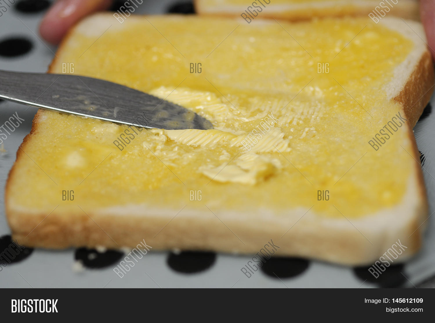 Spreading Butter On Warm Toast Image & Photo Bigstock