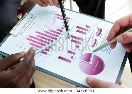 Picture or Photo of Close-up of business document being discussed at meeting