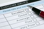 stock photo of survey  - Tick placed in excellent checkbox on customer service satisfaction survey form - JPG 