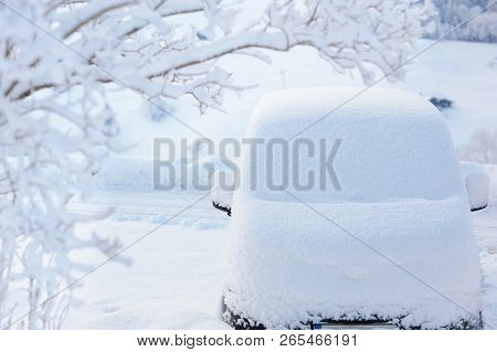 Poster: Car Covered With Snow After