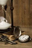 stock photo of watch  - Vintage grunge still life with hour glass - JPG 