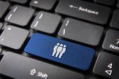 pic of team  - Human resources key with network team icon on laptop keyboard - JPG 