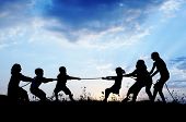foto of paradise  - Kids playing tug war pulling rope - JPG 