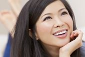 stock photo of asian  - Close up portrait of a beautiful young Chinese Asian Oriental woman - JPG 