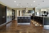 picture of home  - Kitchen in luxury home with dark cabinetry - JPG 
