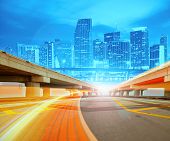 foto of speed  - Abstract Illustration of an urban highway going to the modern city downtown - JPG 