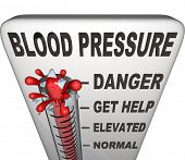 pic of normal  - Blood Pressure words on a thermometer measuring your hypertension - JPG 