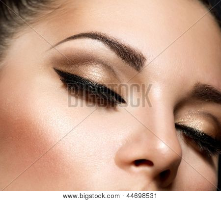 Picture or Photo of Eye Makeup. Beautiful Eyes Retro Style Make-up. Holiday Makeup detail. Eyeliner