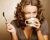 stock photo of food  - young pretty woman drinking coffee - JPG 