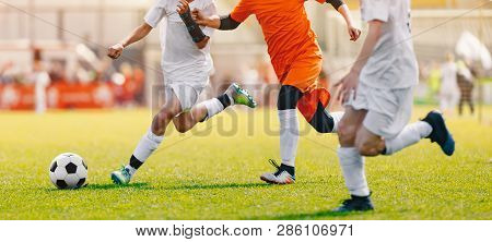 Poster: Soccer Shot Young Boys Kicking