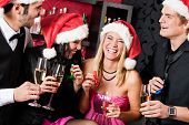 image of cheerful  - Christmas party cheerful friends at having drink and fun - JPG 